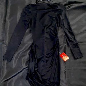 Long sleeved backless little black dress